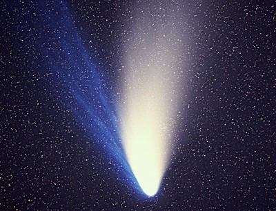 In the tail of comets and other celestial bodies or astrophysical environments s